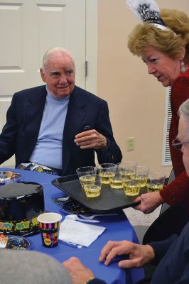 Noon Year’s Eve
The year 2014 arrived a little early on Tuesday afternoon for the guests at the Senior Center’s Annual New Year’s Eve party. It was a “Noon Year’s Eve” party of sorts, with more than enough shiny hats and tiaras, colorful noisemakers, bright balloons, and champagne to go around. Photo by Jean Perry
