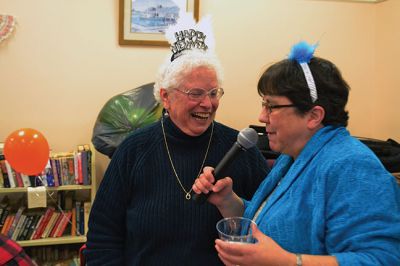 Noon Year’s Eve
The year 2014 arrived a little early on Tuesday afternoon for the guests at the Senior Center’s Annual New Year’s Eve party. It was a “Noon Year’s Eve” party of sorts, with more than enough shiny hats and tiaras, colorful noisemakers, bright balloons, and champagne to go around. Photo by Jean Perry
