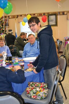 Noon Year’s Eve
The year 2014 arrived a little early on Tuesday afternoon for the guests at the Senior Center’s Annual New Year’s Eve party. It was a “Noon Year’s Eve” party of sorts, with more than enough shiny hats and tiaras, colorful noisemakers, bright balloons, and champagne to go around. Photo by Jean Perry
