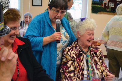 Noon Year’s Eve
The year 2014 arrived a little early on Tuesday afternoon for the guests at the Senior Center’s Annual New Year’s Eve party. It was a “Noon Year’s Eve” party of sorts, with more than enough shiny hats and tiaras, colorful noisemakers, bright balloons, and champagne to go around. Photo by Jean Perry
