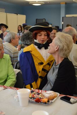 Seniors Appreciation at Center School
One of the highlights of the third-grade school year, students dressed up as famous Americans and treated senior citizens from the Council on Aging to a senior citizen appreciation breakfast the morning of June 6. The third-graders sang patriotic songs like the Star-Spangled Banner and My Country ‘Tis of Thee, dressed as the American figure of their choice. Photo by Jean Perry
