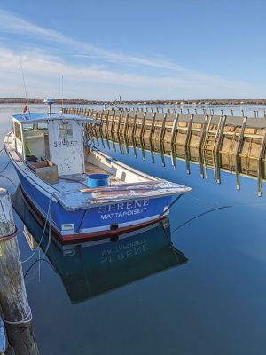 Serene
A boat named “Serene” rests in serene waters as one of the early-bird vessels observed in local harbors this spring. The boat was spotted on an especially calm Easter Sunday morning of April 9 at Shipyard Park in Mattapoisett Harbor. Photo by Robert Price. April 20, 2023 edition
