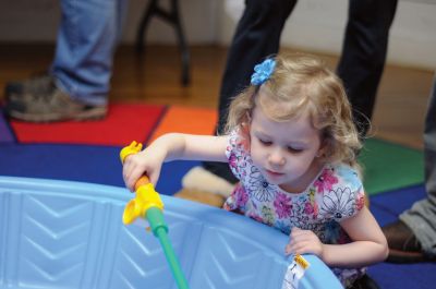 Dr. Suess' Birthday Party
2 year old Lyla McPherson of Fairhaven fishes for one fish two fish red fish blue fish. (Photo by Felix Perez)
