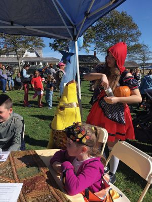 Fall Free Family Fun Festival
The sixth annual Lions Club Fall Free Family Fun Festival was held on October 22 in Shipyard Park. Hundreds of children enjoyed face painting, fortune tellers, hayrides and games with a Halloween theme. King Lion Kimberly Ray said the event is an opportunity for people of all economic backgrounds to enjoy a family day together for free. Pumpkins and candy were handed out, while festive Halloween tunes filled the air. Photos by Marilou Newell
