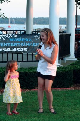 Summer Concert
The Showstoppers closed out the Seaport Village Summer Concert Series at Mattapoisett's Shipyard Park on Saturday evening, September 5. The event brought several hundred people to the Mattapoisett waterfront for a family friendly, fun filled evening of entertainment as the talented young singers performed popular hits and Broadway standards while many in the audience ate picnic suppers. Photo by Robert Chiarito
