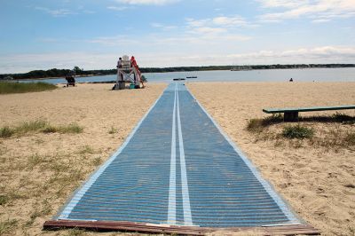 Silvershell Beach
Silvershell Beach now has an accessible mat to help the elderly and physically disabled safely and comfortably move across the softer sand to the water's edge. Photo by Mick Colageo
