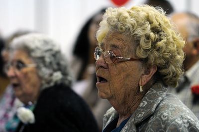 The Singing Trooper
Dan “The Singing Trooper” Clark and his wife, Mary, entertain attendees at Saturday’s Friends of Benjamin D. Cushing Veterans of Foreign Wars Post 2425 benefit recognizing members and the Ladies Auxiliary in Marion. Photos by Felix Perez. 
