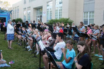 Sippican Elementary School hosted Band Blast on June 24, as El Caribe entertained visitors who enjoyed a rocking party full of fun and frolic on the front lawn of the school. The event was capped off in the evening by a series of performances featuring Sippican students, culminating in a collection of the bands. Photos by Mick Colageo
