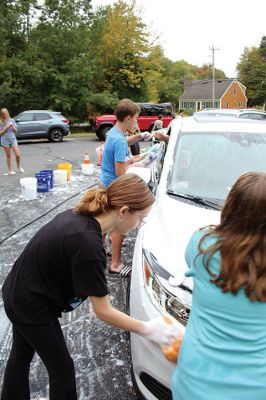 Car Wash
Grade 6 at Sippican Elementary School students turned a dreary Saturday into some fun while washing cars at Marion Fire Station 2 to raise money for their spring-season class trip. Photos by Mick Colageo
