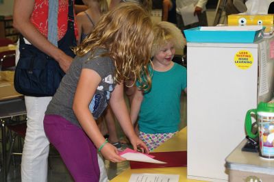 Sippican School Open House
Sippican School students had the chance to meet their teachers and discover their classrooms on August 31, the final day of school vacation. Each teacher devised their own scavenger hunt for the kids that helped the students discover their classrooms. Some older students were eager to find their desks and begin stocking them with brand new school supplies in anticipation of the big day. Photos by Jean Perry
