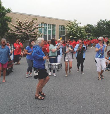 Sippican School Graduation
Sippican School's sixth graders wore special red t-shirts and marched around their Marion campus to an ensemble of percussion as they prepared to celebrate their promotion. Photos by Mick Colageo
