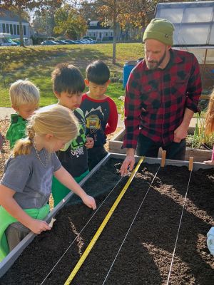 Sippican Elementary School
Sippican Elementary School third graders and Nate Sander of the Marion Institute plant garlic and clover during the Grow FTS program. The students learned about how the sun and soil work together to produce an environment conducive for a plant to grow and thrive. Photos courtesy ORR District 
