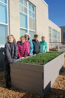 From left, Sippican Elementary School third-graders Rowan Berube-King, Amina Goodman, Liv Chase, Abel Philbrook and Amelia Whinnem are among students participating in a gardening project recently launched by Nate Sander of The Marion Institute. The children are learning about how the sun and soil work together to produce an environment conducive for plants. Photo by Mick Colageo - December 28, 2023 edition
