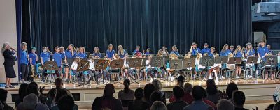 Sippican Beginner Band
Hannah Moore, Instrumental/Band teacher directing the Beginner Band. Next stop will be the Marion Memorial Day Parade. Photos courtesy of Erin Bednarczyk
