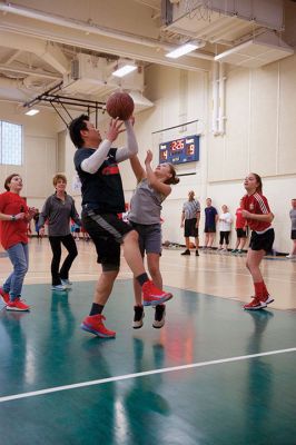 Sippican School Basketball
The Sippican School gymnasium was lit up the night of Thursday, March 23, for the annual sixth grade versus staff and parents basketball game. The adult team seemed to have fun giving the students a consistently hard time throughout, but in the end, it was the students who triumphed 37-33. Photos by Colin Veitch
