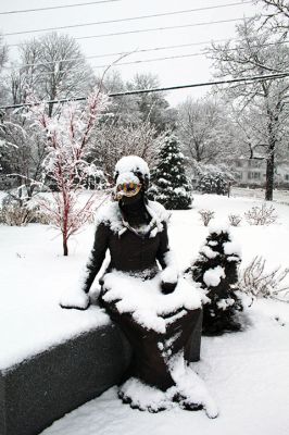 Snow Day
Mardi Gras ended prematurely for Elizabeth Taber, whose festive mask and colorful beads were covered in snow as her likeness sat on Tuesday in Bicentennial Park across from the Marion Town House. Southeastern Massachusetts was hit with the worst of the nor’easter that had been in the weather forecast for several days. Photo by Mick Colageo - February 15, 2024 edition
