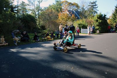 Soapbox Derby
Marion and Rochester Cub Scouts came together on November 6 for a soapbox derby on Holmes Street in Marion. The longtime fundraising event was not held in 2020 due to the coronavirus pandemic but made a roaring return on Saturday, as children raced their homemade go-carts and collected donations for the Murphy and Others, Living Interdependently for Future Endeavors, Inc. (M.O. L.I.F.E.) non-profit food pantry in Fairhaven. Photos by Mick Colageo and Reade Whinnem
