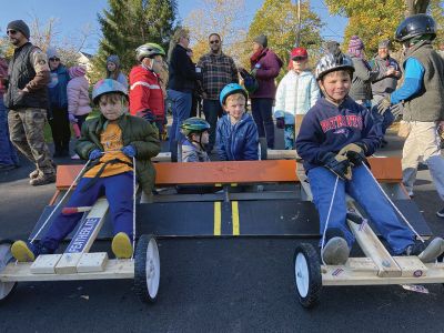 Soapbox Derby
Marion and Rochester Cub Scouts came together on November 6 for a soapbox derby on Holmes Street in Marion. The longtime fundraising event was not held in 2020 due to the coronavirus pandemic but made a roaring return on Saturday, as children raced their homemade go-carts and collected donations for the Murphy and Others, Living Interdependently for Future Endeavors, Inc. (M.O. L.I.F.E.) non-profit food pantry in Fairhaven. Photos by Mick Colageo and Reade Whinnem
