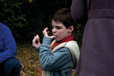 Salty Soiree
Liam Waldron of Mattapoisett enjoys some s’mores at the Salty Soiree at Dunseith Gardens on Saturday, October 20.  Families were invited to listen to ghost stories and sing spooky songs after sundown.  Photo by Eric Tripoli.
