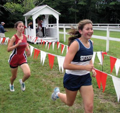 ORR Cross Country
ORR track athlete Emily Roseman, left, vies with a Seekonk runner for first place at a September 11, 2010 meet at Washburn Park. Photo by Ben Resendes.
