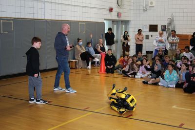 Spot
Rochester Memorial School students were treated on Tuesday afternoon to an educational exhibition of the dog-like robot "Spot," a $200,000 machine of which there are approximately 1,500 in the world, according to Kevin Garell, a Rochester resident who works for Waltham-based Boston Dynamics, the manufacturer of the robot. Garell was assisted in two presentations by his sons Gavin and Grady. Photos by Mick Colageo
