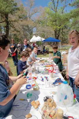 Annual Marion SpringFest
May 9 was the day of the Annual Marion SpringFest sponsored by the Sippican Lands Trust and the Tree and Parks Committee! There was a performance by the Toe Jam Puppet Band, a Birds of Prey demonstration, face painting, and a rock-climbing wall. All over Marion on Saturday you could see signs on the spring season, including the Recreation Department’s annual event, “Touch a Truck.” Photos by Colin Veitch
