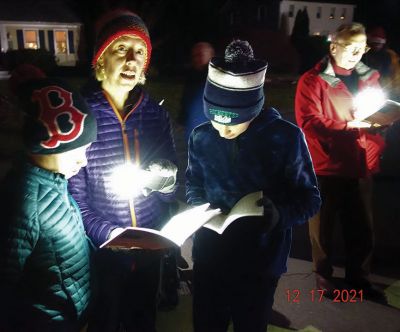 Caroling
On December 17, members of St. Gabriel's Episcopal Church in Marion went caroling. After warming up with hot cider and cookies, we walked along Joanne Drive, stopping to sing Christmas carols for many of the residents. We were greeted with smiles when people opened their front doors to hear us sing. Photos courtesy of Tanya Ambrosi
