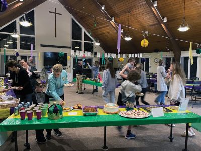 St. Gabriel’s Episcopal Church
On February 21, St. Gabriel’s Episcopal Church in Marion celebrated Fat Tuesday with a Mardi Gras party. We ate delicious food and played lots of great games. Many thanks to the Youth Group for all their hard work preparing the evening’s Louisiana-style foods and for leading the games. Everyone was invited to bring and share their favorite dish or dessert and enter the Mardi Gras Cookoff. The winners were crowned this year’s Mardi Gras queens. Photos courtesy of Tanya Ambrosi
