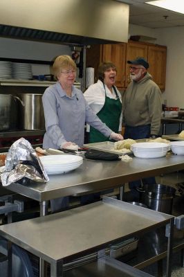 Rochester Council on Aging St. Patrick's Day Luncheon
The folks at the Rochester Council on Aging never miss a holiday or a chance to gather together to celebrate. On Friday, March 14, the COA hosted an Irish luncheon, complete with, of course, corned beef and cabbage to mark the occasion. Irish or not, most donned their St. Paddy’s green and  broke bread together with Selectman Naida Parker, who assisted in serving up lunch, along with COA Director Sharon Lally. At the COA, Irish eyes are always smiling… By Jean Perry
