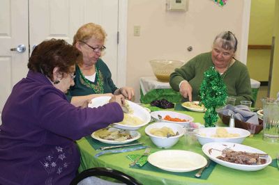 Rochester Council on Aging St. Patrick's Day Luncheon
The folks at the Rochester Council on Aging never miss a holiday or a chance to gather together to celebrate. On Friday, March 14, the COA hosted an Irish luncheon, complete with, of course, corned beef and cabbage to mark the occasion. Irish or not, most donned their St. Paddy’s green and  broke bread together with Selectman Naida Parker, who assisted in serving up lunch, along with COA Director Sharon Lally. At the COA, Irish eyes are always smiling… By Jean Perry
