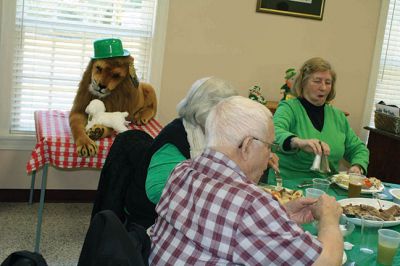 Rochester Council on Aging St. Patrick's Day Luncheon
The folks at the Rochester Council on Aging never miss a holiday or a chance to gather together to celebrate. On Friday, March 14, the COA hosted an Irish luncheon, complete with, of course, corned beef and cabbage to mark the occasion. Irish or not, most donned their St. Paddy’s green and  broke bread together with Selectman Naida Parker, who assisted in serving up lunch, along with COA Director Sharon Lally. At the COA, Irish eyes are always smiling… By Jean Perry
