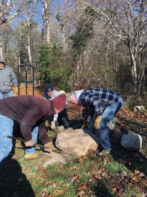 Mattapoisett Land Trust
Peter Davies of the Mattapoisett Land Trust held a stone wall building workshop at the MLT's Oliver Wendell Holmes Jr. trailhead and homestead on November 20. Photos by Marilou Newell
