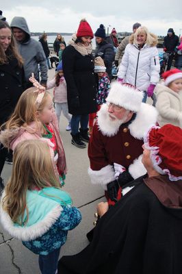 Marion’s Christmas Stroll 
The Town of Marion’s annual Christmas Stroll held on December 11 featured rides with Santa and Mrs. Claus on horse-drawn carriages, live entertainment from the Sippican Elementary School musicians, Christmas songs performed by Tabor Academy students, children’s activities and many refreshments offered along the sidewalks by village merchants. Photos by Mick Colageo
