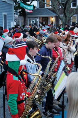 Marion’s Christmas Stroll 
The Town of Marion’s annual Christmas Stroll held on December 11 featured rides with Santa and Mrs. Claus on horse-drawn carriages, live entertainment from the Sippican Elementary School musicians, Christmas songs performed by Tabor Academy students, children’s activities and many refreshments offered along the sidewalks by village merchants. Photos by Mick Colageo
