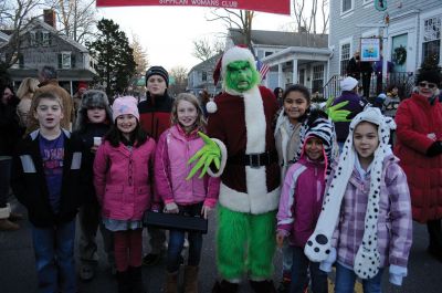 Marion Holiday Stroll 
Santa, the Grinch, the Cottage Street Jam Band from Sippican School and a man on stilts were all part of the festivities at the annual Holiday Stroll in Marion village on Sunday, December 11, 2011. The Stroll ended at Bicentennial Park for a tree lighting at dusk. Photo by Felix Perez.
