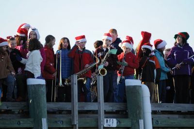 Marion Holiday Stroll 
The Cottage Street Jam Band from the Sippican School led the way for Santa at the annual Marion Holiday Stroll on Sunday, December 11, 2011. Santa arrived at Barden's Boatyard and led the festivities to Bicentennial Park for the tree lighting. Photo by Felix Perez.
