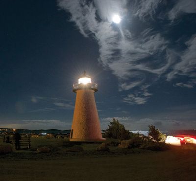 Supermoon Eclipse
A blood red Harvest Moon hangs above Ned’s Point in Mattapoisett where some people had a stellar view of the rare celestial event of a total lunar eclipse of a supermoon. Dozens came to watch the moon on Sunday night as it passed through the Earth’s shadow between 9:07 pm, when the partial eclipse began, and 12:27 am when the spectacle ended. Photo by Colin Veitch
