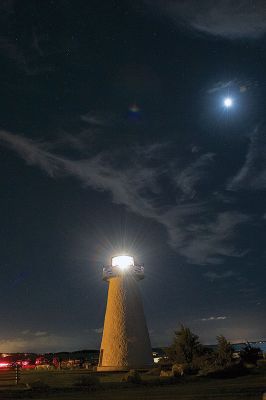 Supermoon Eclipse
A blood red Harvest Moon hangs above Ned’s Point in Mattapoisett where some people had a stellar view of the rare celestial event of a total lunar eclipse of a supermoon. Dozens came to watch the moon on Sunday night as it passed through the Earth’s shadow between 9:07 pm, when the partial eclipse began, and 12:27 am when the spectacle ended. Photo by Colin Veitch
