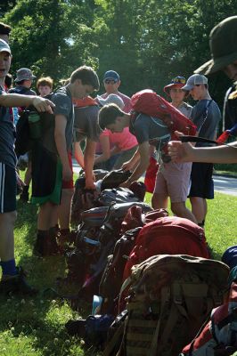 Stayin’ Alive 
Survival Week at ORR Junior High kicked off on the early morning of Sunday, June 17, as the 7th-graders boarded the busses for Western Massachusetts for a week of roughing it in the wild. And for this generation, that simply means no electronic devices and no Dunkin’ Donuts. Survival is now in its 46th year and still going strong. Some, like Survival leader Kevin “KT the Kilt Man” Thompson, have attended Survival since they were 7th-graders 30 years ago. Photos by Jean Perry
