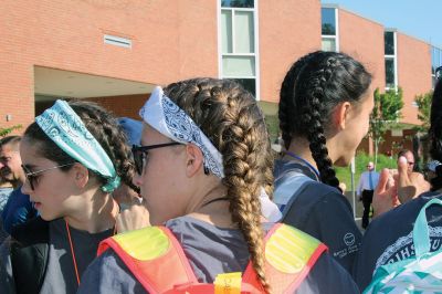 Stayin’ Alive 
Survival Week at ORR Junior High kicked off on the early morning of Sunday, June 17, as the 7th-graders boarded the busses for Western Massachusetts for a week of roughing it in the wild. And for this generation, that simply means no electronic devices and no Dunkin’ Donuts. Survival is now in its 46th year and still going strong. Some, like Survival leader Kevin “KT the Kilt Man” Thompson, have attended Survival since they were 7th-graders 30 years ago. Photos by Jean Perry
