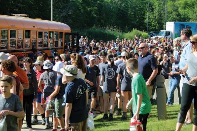 Stayin’ Alive 
Survival Week at ORR Junior High kicked off on the early morning of Sunday, June 17, as the 7th-graders boarded the busses for Western Massachusetts for a week of roughing it in the wild. And for this generation, that simply means no electronic devices and no Dunkin’ Donuts. Survival is now in its 46th year and still going strong. Some, like Survival leader Kevin “KT the Kilt Man” Thompson, have attended Survival since they were 7th-graders 30 years ago. Photos by Jean Perry
