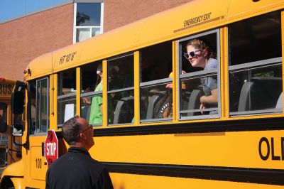 Stayin’ Alive 
Survival Week at ORR Junior High kicked off on the early morning of Sunday, June 17, as the 7th-graders boarded the busses for Western Massachusetts for a week of roughing it in the wild. And for this generation, that simply means no electronic devices and no Dunkin’ Donuts. Survival is now in its 46th year and still going strong. Some, like Survival leader Kevin “KT the Kilt Man” Thompson, have attended Survival since they were 7th-graders 30 years ago. Photos by Jean Perry
