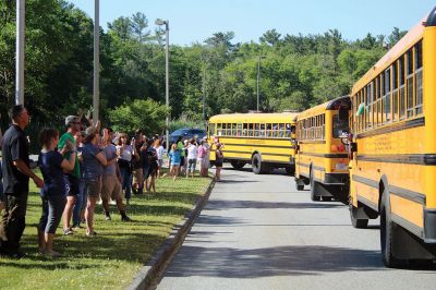 Stayin’ Alive 
Survival Week at ORR Junior High kicked off on the early morning of Sunday, June 17, as the 7th-graders boarded the busses for Western Massachusetts for a week of roughing it in the wild. And for this generation, that simply means no electronic devices and no Dunkin’ Donuts. Survival is now in its 46th year and still going strong. Some, like Survival leader Kevin “KT the Kilt Man” Thompson, have attended Survival since they were 7th-graders 30 years ago. Photos by Jean Perry
