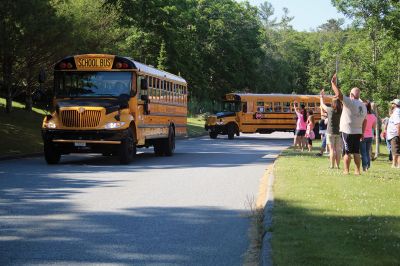 Stayin’ Alive 
Survival Week at ORR Junior High kicked off on the early morning of Sunday, June 17, as the 7th-graders boarded the busses for Western Massachusetts for a week of roughing it in the wild. And for this generation, that simply means no electronic devices and no Dunkin’ Donuts. Survival is now in its 46th year and still going strong. Some, like Survival leader Kevin “KT the Kilt Man” Thompson, have attended Survival since they were 7th-graders 30 years ago. Photos by Jean Perry
