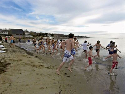 Christmas Swim
More than 41 swimmers braved fiercely cold waters during the 2010 Christmas Swim, a fundraiser for the Mattapoisett nonprofit organization Helping Hands and Hooves. HHH provides therapeutic horseback riding lessons to disabled adults. Photos courtesy of Debbi Dyson.
