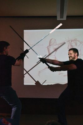 Cold Steel
“Cold Steel” was one of the educating and exciting free programs the Mattapoisett Free Library offers during the summer. Visitors learned all about the history of swords and the origins of sword fighting, while Jeff Lord and Jeff Goodkind from the Association for Renaissance and Medieval Swordsmanship gave live demonstrations before a crowd of enthusiastic kids and adults. Photos by Jean Perry
