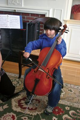 Symphony Tales
About 80 adults and preschoolers enjoyed a special dual performance: live storytelling of the book “Scritch Scratch A Perfect Match” accompanied by cello playing from New Bedford Symphony Orchestra musician Shay Rudolph. The event, sponsored by the Elizabeth Taber Library, tied together music and literacy for young beginning readers. Photo courtesy of Sharon Bartholomew.
