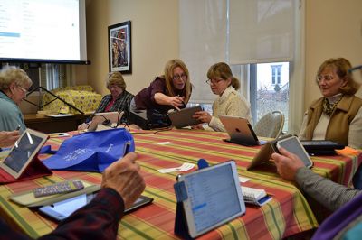 iPads and iPhones
Bringing with them a lot of patience and persistence, a group of 11 Marion residents took advantage of a free technology instruction group, offered at the Elizabeth Taber Library on January 11, designed to teach novices the basics on how to use their iPads and iPhones. Photo by Jean Perry
