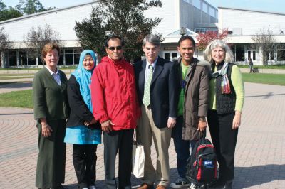 Thai Visitors
Three Thai teachers are visiting the Tri-Town area for two weeks in October to observe American teaching methods. From left to right, Lah Bualuang, Ding Tanada, and Somrak Sinsomros stand outside Tabor Academy waiting to go to Plimouth Plantation for a fun afternoon on October 12, 2009. The three teachers enjoyed an all-American lunch in the Tabor cafeteria before heading to their next destination.
