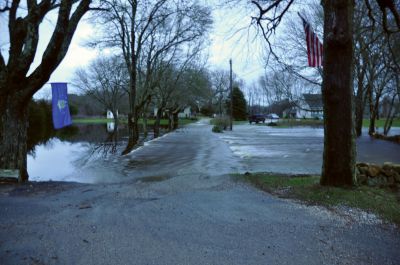 River Road Flood
A rainstorm on March 29 and 30 wreaked havoc on Massachusetts, leaving the Commonwealth in a state of emergency. The real fall-out didnt arrive until March 31, when water tables reached record heights and dams in the region were tested to their maximum capacity. The Hathaway Pond Dam in Rochester needed reinforcement with sandbags and the area of Plumb Corner and Dexter Lane became a makeshift pond. The Mattapoisett River overflowed its banks, shutting down River Road for a day. Photos by Tim Smith.
